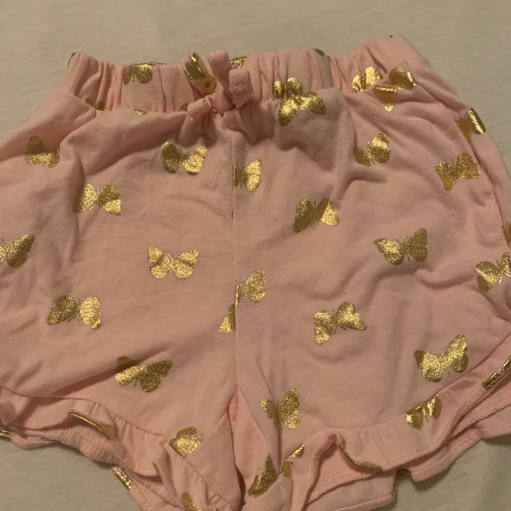 Pink and gold butterfly shorts